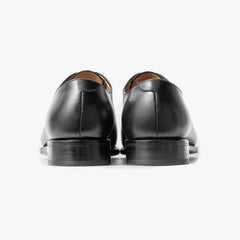 Close-up of the sole and heel showing craftsmanship, edge finishing, and durable construction.