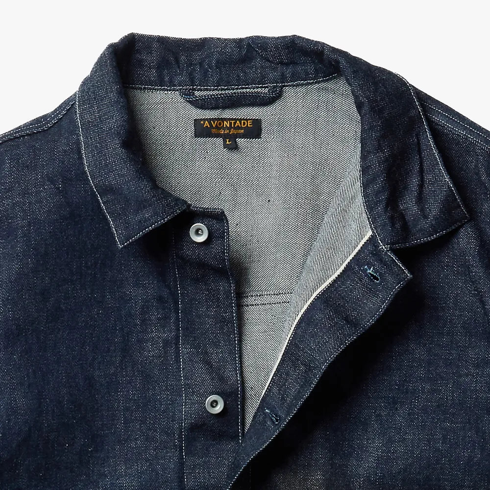Front view of the A Vontade Coal Mine Blouse in indigo showing the classic workwear silhouette, button-front closure, and structured design.