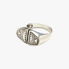 Close-up of the Agolid Ring highlighting engraved motifs, surface texture, and artisanal metalwork.