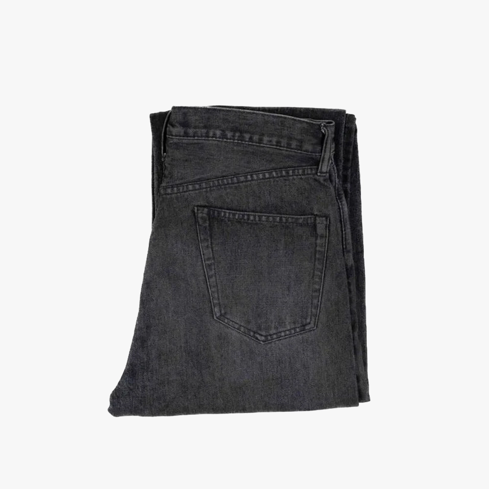 Folded view of the Ark Madison Black Garment Wash Jeans showing fabric texture, pocket placement, and washed black tone.
