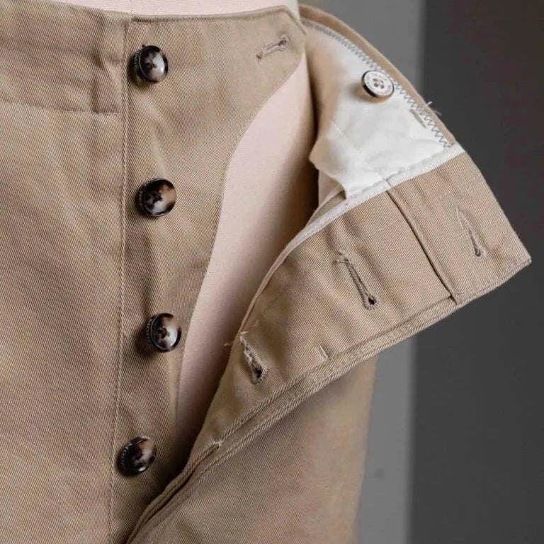Close-up of the zip area and top button on the Barnstormer Officer Chino Beige showing the fly construction and hardware.