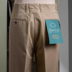 Back view of the Barnstormer Officer Chino Beige showcasing the welt pockets and refined construction.