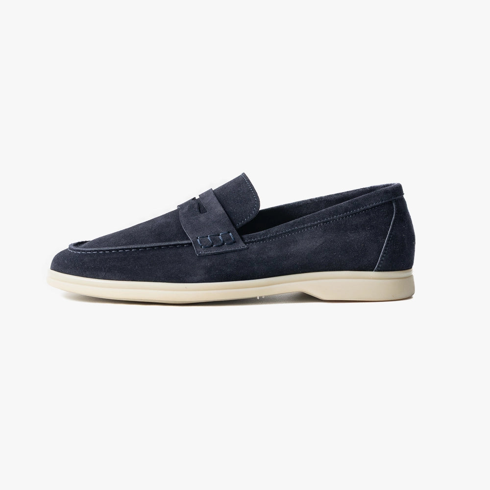 Side view highlighting the penny strap detail, flexible construction, and balanced profile.