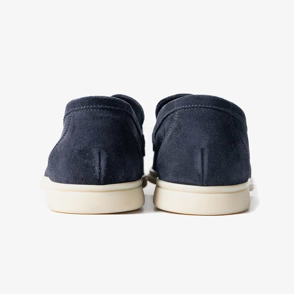 Close-up of the flexible leather sole showing clean edge finishing and comfort-focused construction.
