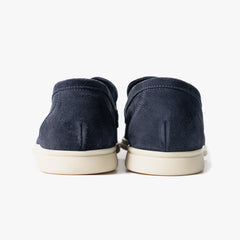 Close-up of the flexible leather sole showing clean edge finishing and comfort-focused construction.