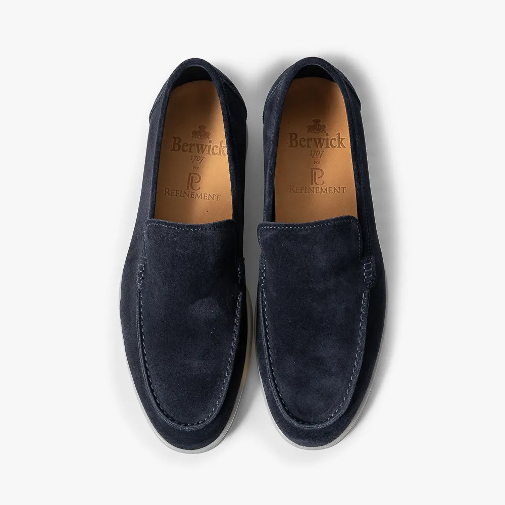 Angled view showing the apron stitching, toe shape, and overall silhouette of the 5716 Baltic loafer.