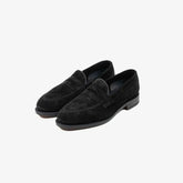 Berwick 5138 Penny Loafer in black suede, angled front view.