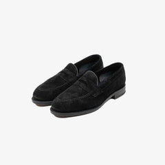 Berwick 5138 Penny Loafer in black suede, angled front view.