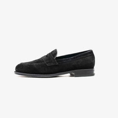 Berwick 5138 Penny Loafer in black suede, side profile showing classic silhouette.