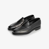 Berwick 5138 Penny Loafer in Chateaubriand black leather, angled front view showing refined profile.