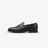 Berwick 5138 Penny Loafer in Nomera dark brown leather, side profile showing classic silhouette.