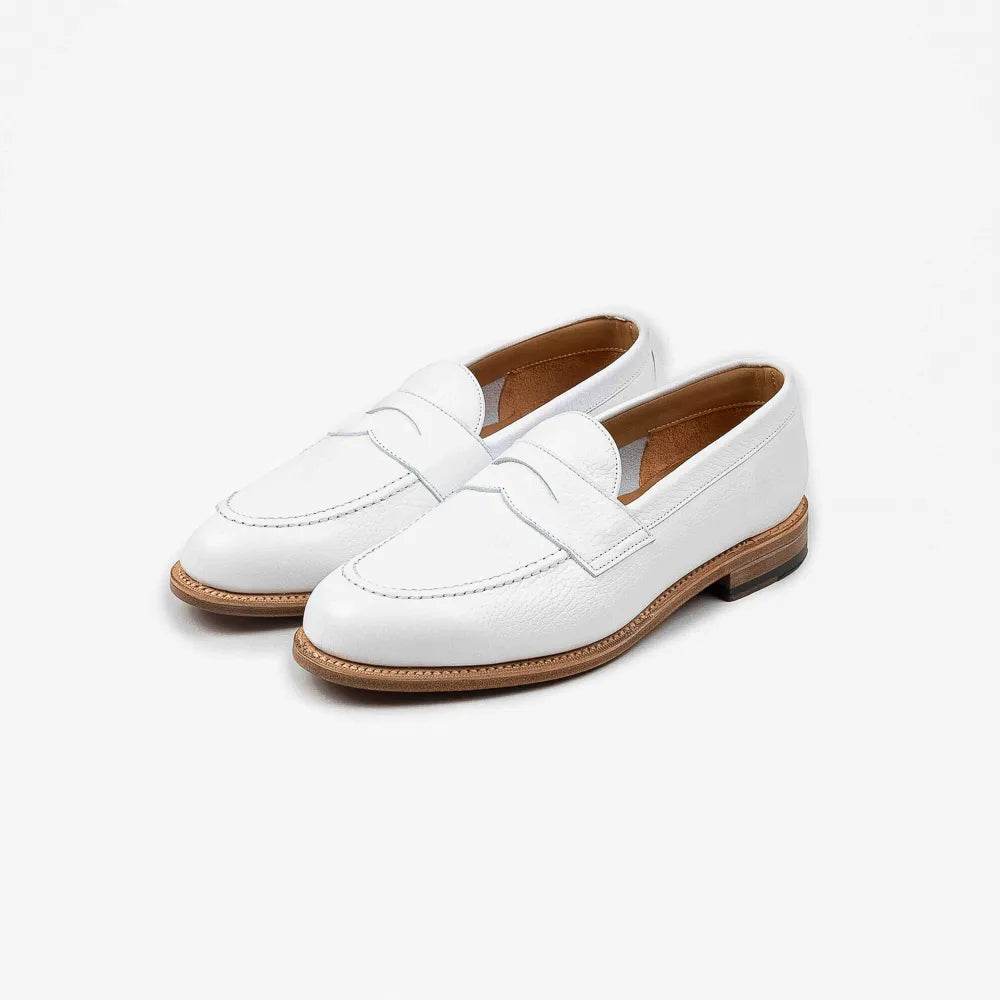 Berwick 5138 Penny Loafer in white grained leather, angled front view.