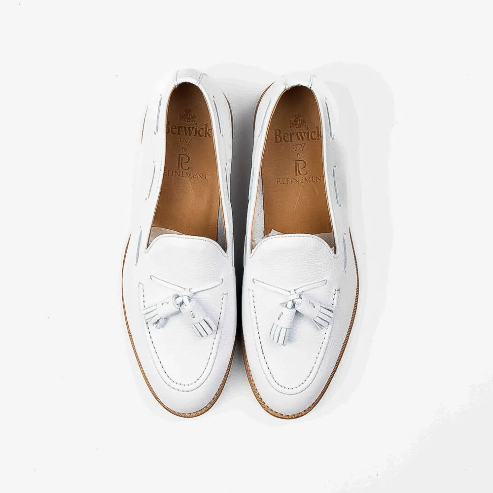 Berwick 5139 Tassel Loafer in white grained leather, top view of pair highlighting tassels.