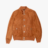 Front view of the Cinquanta Driving Blouson Land showing the refined driving jacket silhouette, warm land-brown suede tone, and clean panel design.