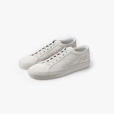 Common Projects Achilles Premium In Suede 2611 Light Gray 0573 Angled Pair View