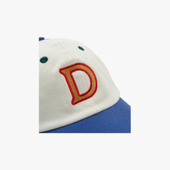 Side view showing the cap’s profile, curved brim, and durable twill texture.