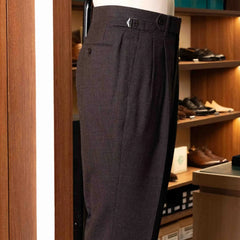 Side view of the Drummers Trousers Brown showing the straight leg profile, side seams, and balanced construction.