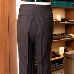 Back view of the Drummers Trousers Brown highlighting back pockets, seam finishing, and structured drape.