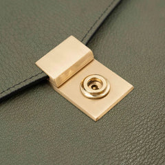 Lock detail of the Frank Clegg 15-inch Lock Portfolio Case Goatskin Mint