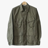 Front view of the Fujito Jungle Fatigue Jacket in olive green showing the military-inspired silhouette, front pockets, and clean utility design.