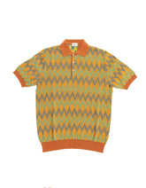 Front view of the Gallia Coleman Polo Jacquard Rust Green showcasing the jacquard pattern and clean silhouette.
