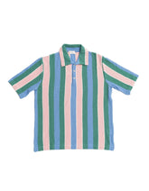 Front angle view of the Gallia Durant Polo in Green, Pink, and Blue, showing the bold color-block design.