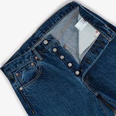 Close-up of the waistband button on the Hand Room Exclusive for Refinement High Rise Regular Fit Mid Washed jeans