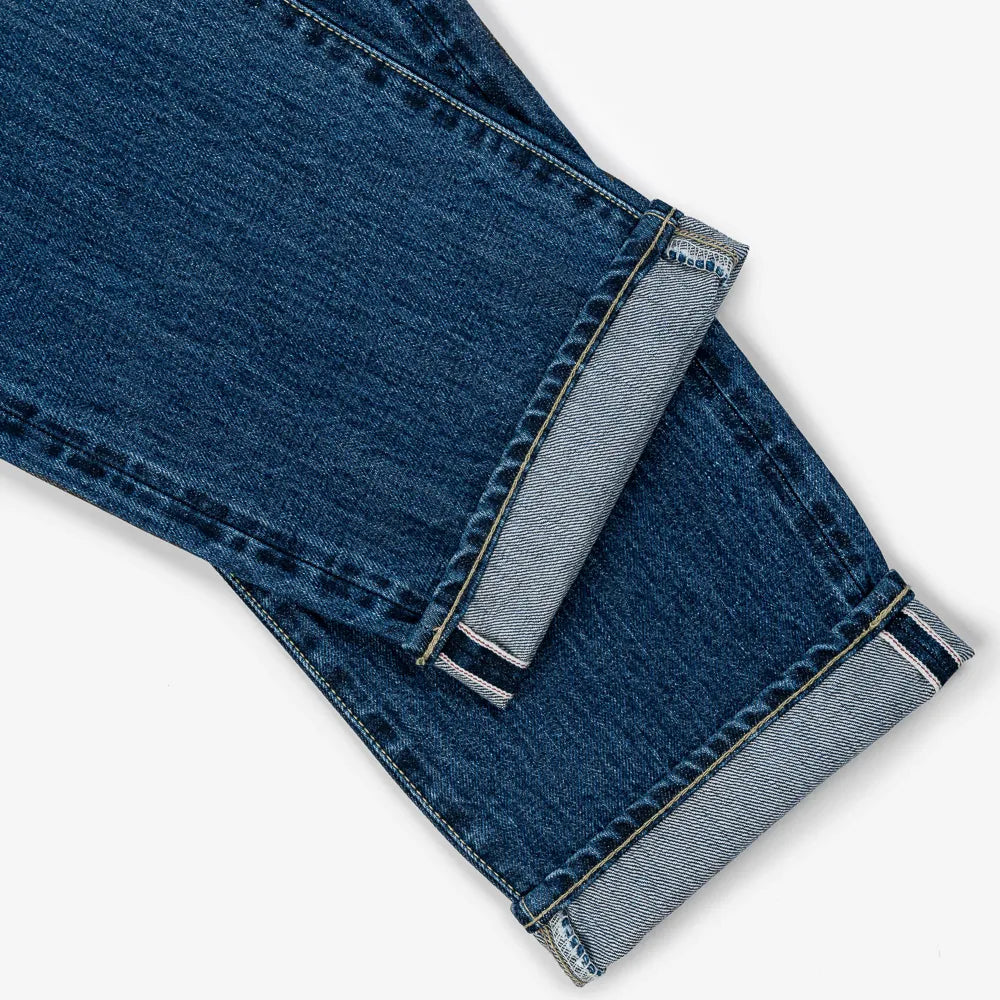 Hem and leg opening detail of the Hand Room Exclusive for Refinement High Rise Regular Fit Mid Washed jeans