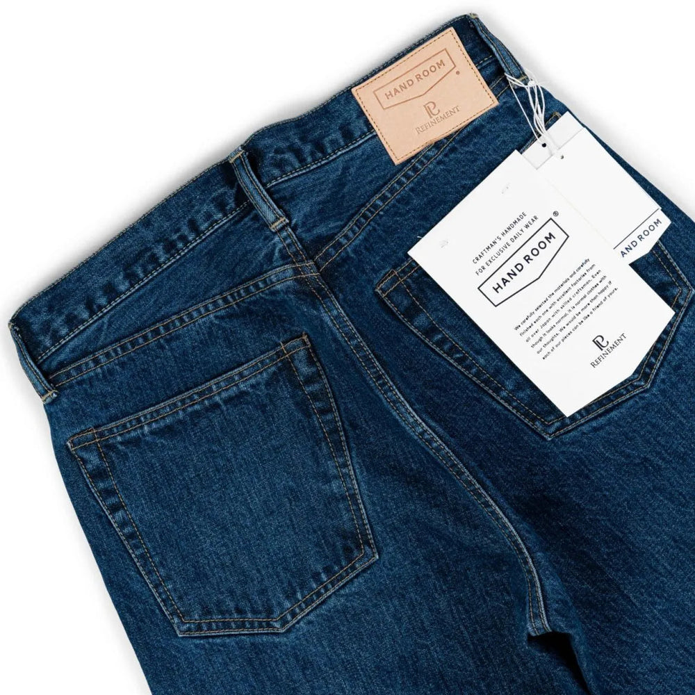 Back pocket detail of the Hand Room Exclusive for Refinement High Rise Regular Fit Mid Washed jeans