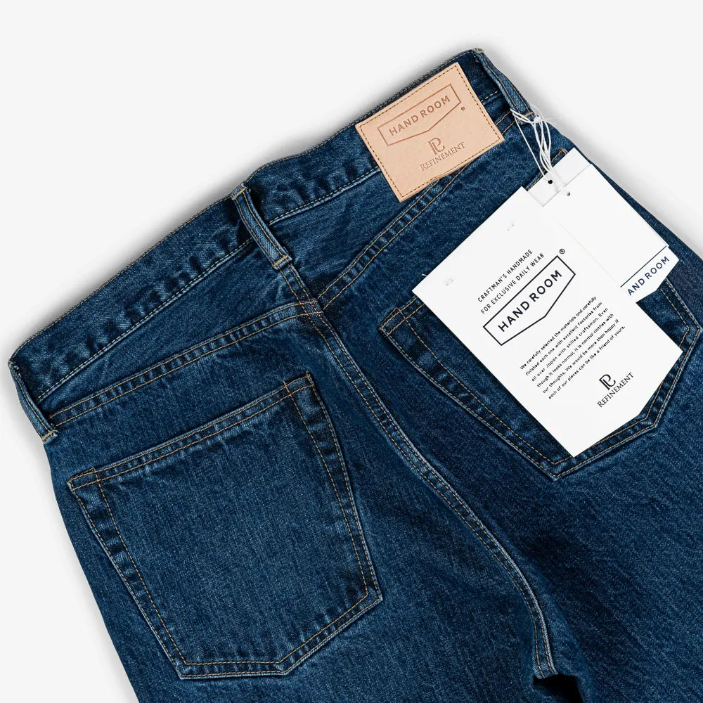 Back pocket detail of the Hand Room Exclusive for Refinement High Rise Regular Fit Mid Washed jeans