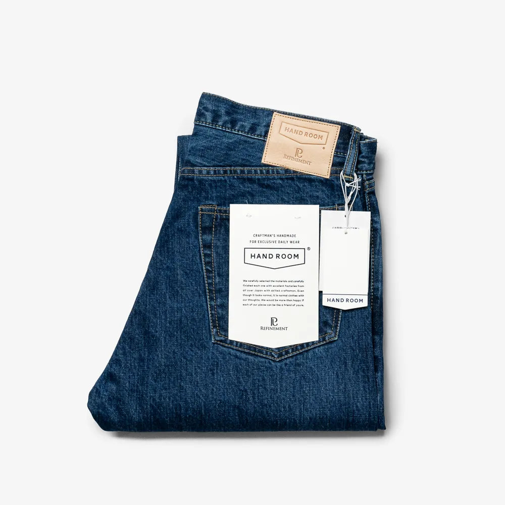 Folded view of the Hand Room Exclusive for Refinement High Rise Regular Fit Mid Washed jeans
