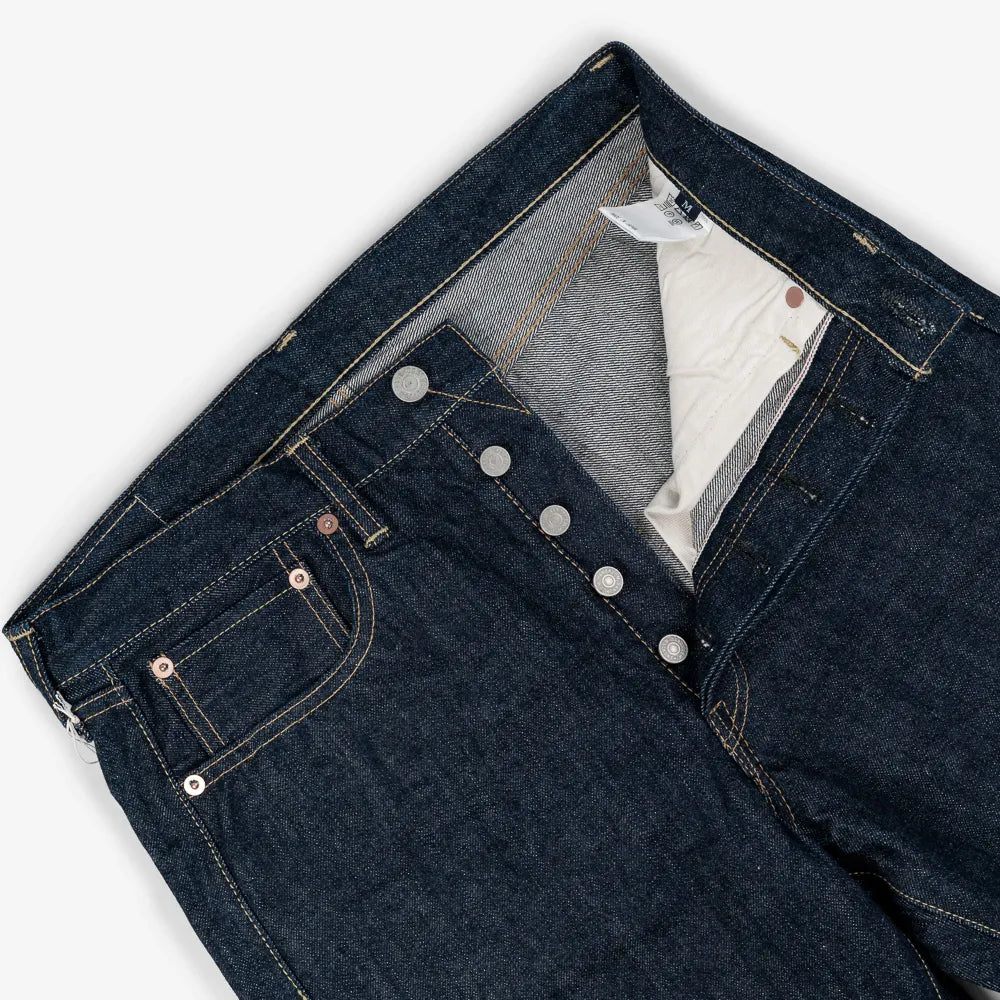 Close-up of the waistband button on the Hand Room Exclusive for Refinement High Rise Regular Fit One Washed Indigo jeans