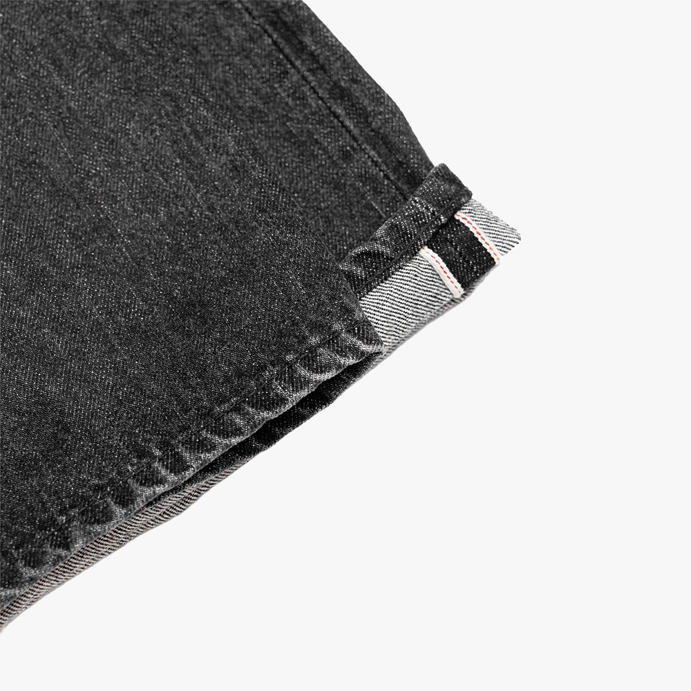 Hem and leg opening detail of the Hand Room Exclusive for Refinement Wide Fit Stonewash Black jeans