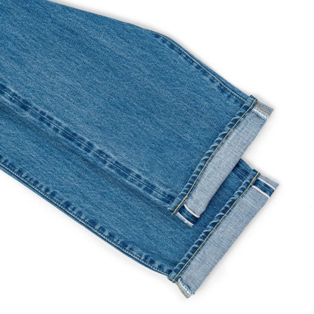 Hem and leg opening detail of the Hand Room Exclusive for Refinement Wide Fit Light Washed jeans