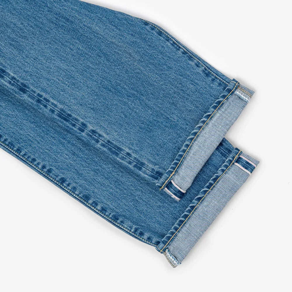 Hem and leg opening detail of the Hand Room Exclusive for Refinement Wide Fit Light Washed jeans