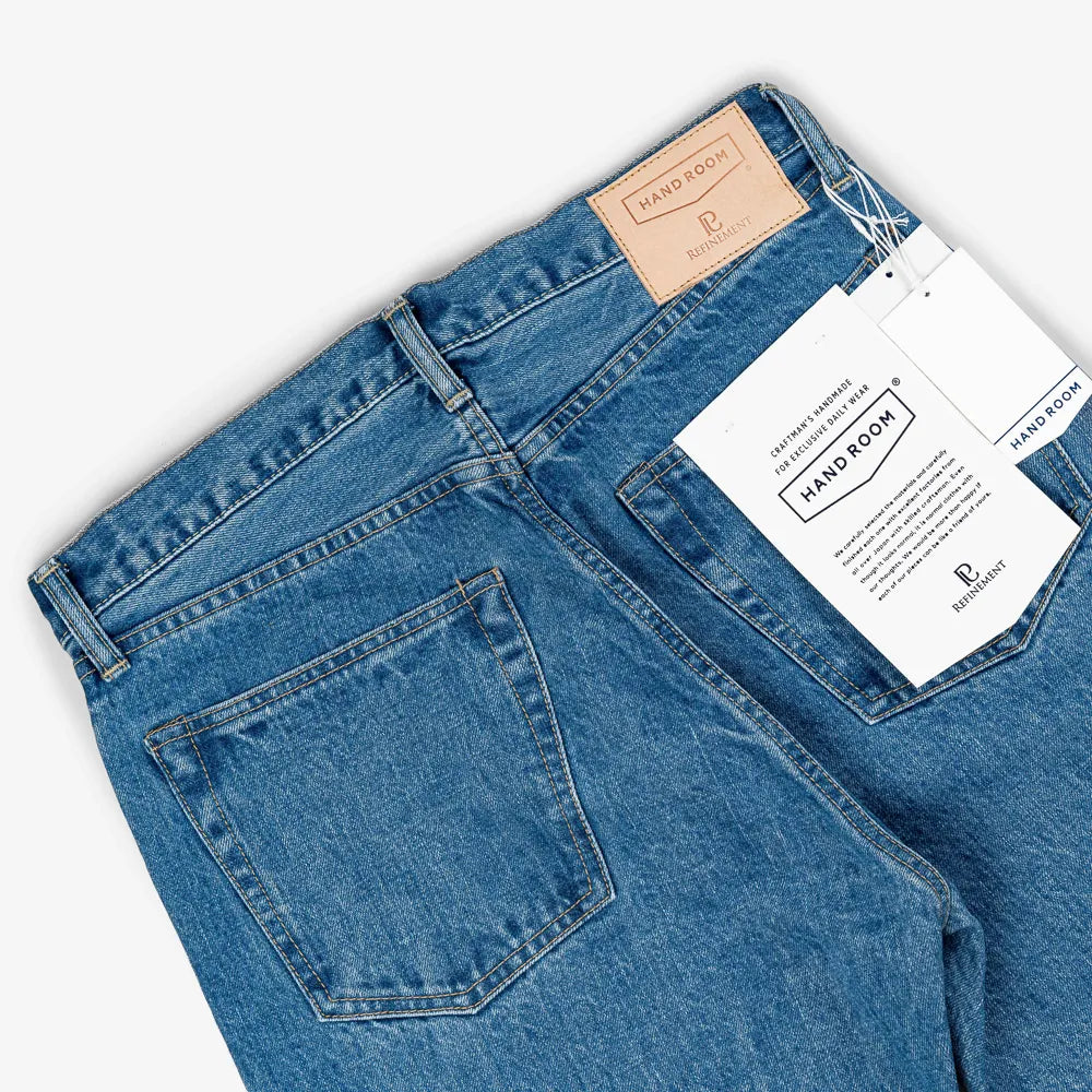 Back pocket detail of the Hand Room Exclusive for Refinement Wide Fit Light Washed jeans