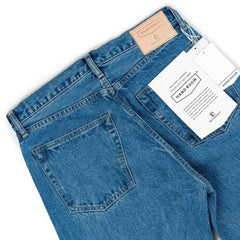 Back pocket detail of the Hand Room Exclusive for Refinement Wide Fit Light Washed jeans
