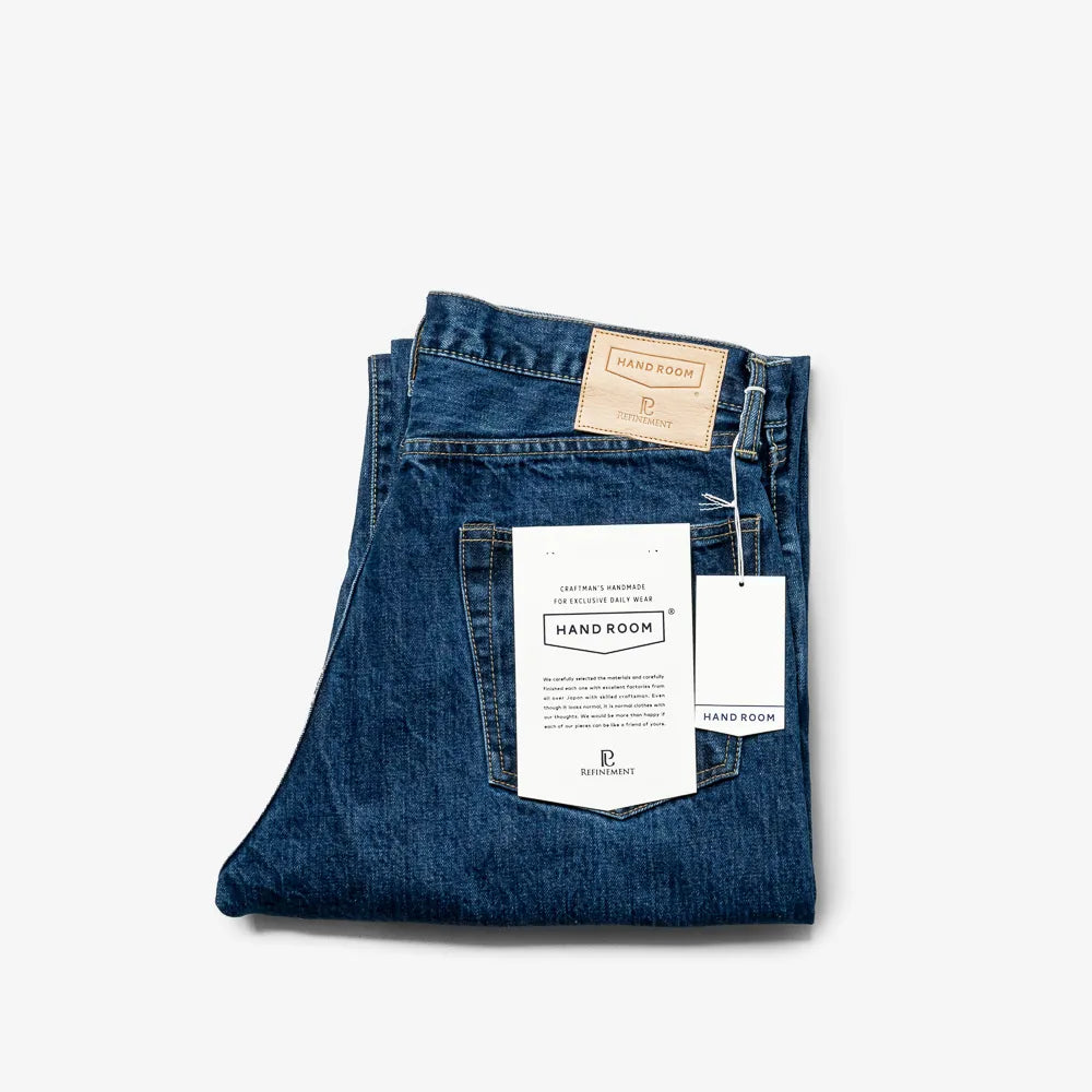 Folded view of the Hand Room Exclusive for Refinement Wide Fit Mid Washed jeans