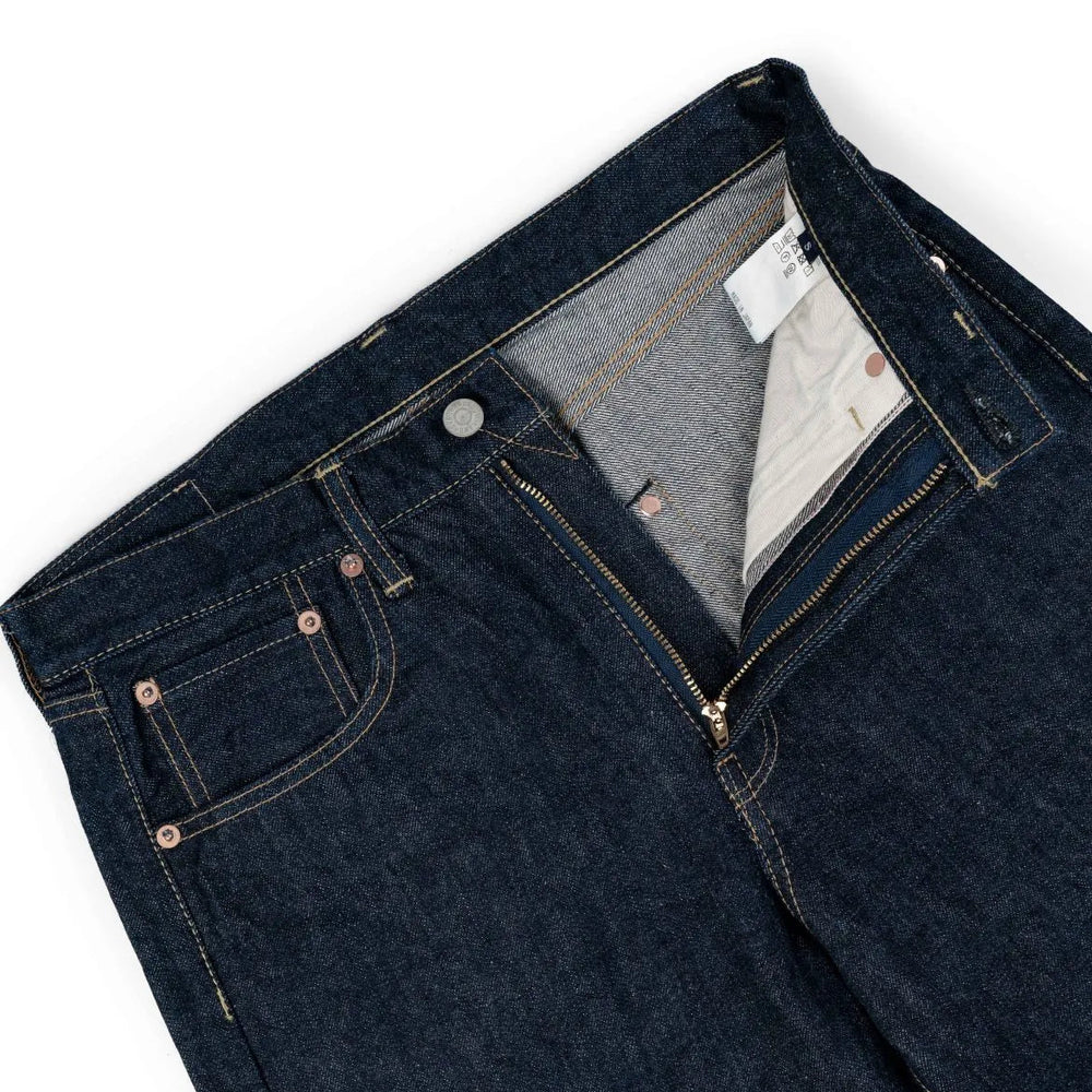 Close-up of the waistband button on the Hand Room Exclusive for Refinement Wide Fit One Washed Indigo jeans