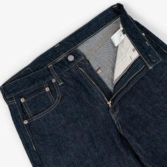 Close-up of the waistband button on the Hand Room Exclusive for Refinement Wide Fit One Washed Indigo jeans