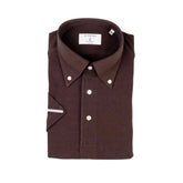 Folded view of the Hitoyoshi for Refinement Button Down Polo Dark Brown showing collar roll, knit texture, and tidy folding.