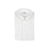 Folded view of the Hitoyoshi for Refinement Button Down Polo Long Sleeve Off White showing collar roll, fabric texture, and tidy folding.