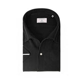 Folded view of the Hitoyoshi for Refinement One Piece Collar Polo Black showing the collar roll, knit pattern, and neat folding.