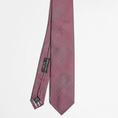 Full view of the Holliday & Brown floral tie in beetroot showing elegant floral pattern and refined proportions.