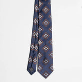 Full view of the Holliday & Brown jacquard tie in navy and brown showing refined woven pattern and elegant proportions.