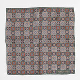 Full view of the Holliday & Brown paisley pocket square in green showing elegant pattern and refined proportions.