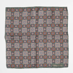 Full view of the Holliday & Brown paisley pocket square in green showing elegant pattern and refined proportions.