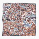 Full view of the Holliday & Brown paisley pocket square in navy and brown showing elegant pattern and refined proportions.