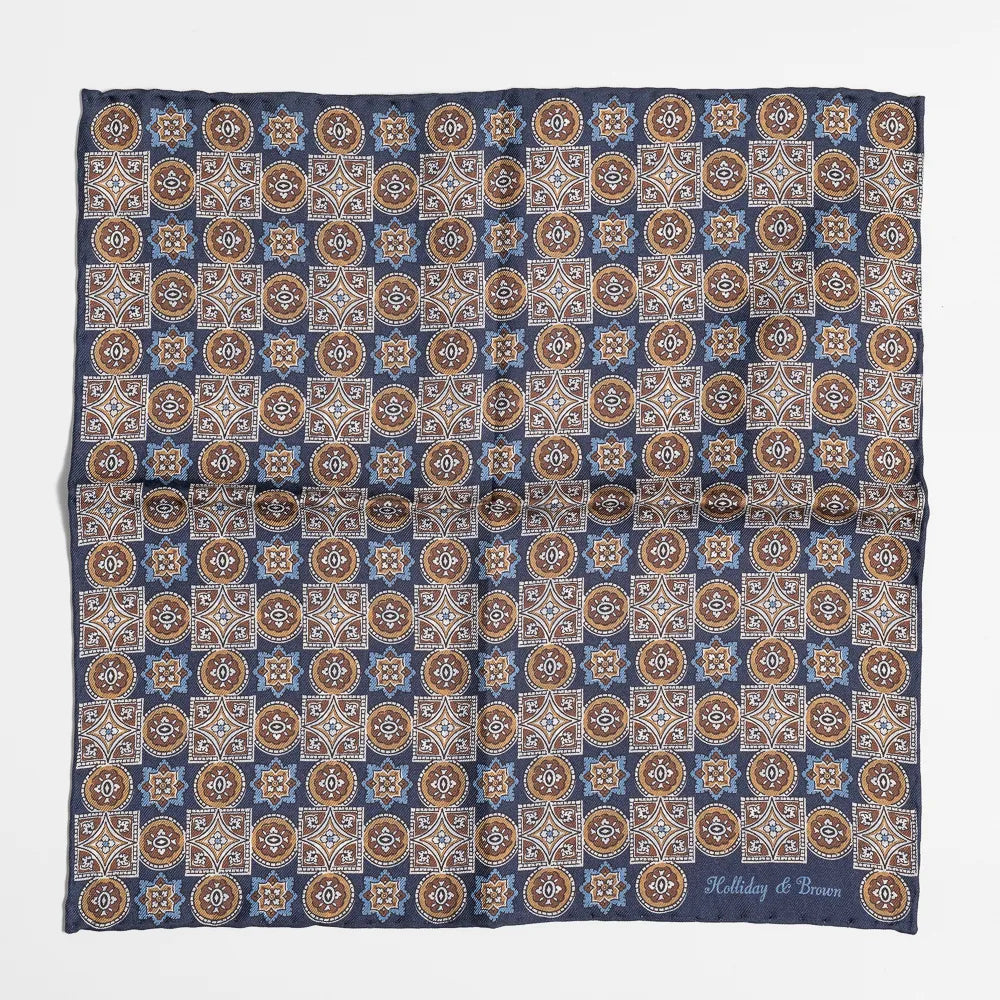 Full view of the Holliday & Brown paisley pocket square in navy showing elegant pattern and refined proportions.