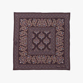 Full view of the Holliday & Brown pocket square in plum, showing the complete pattern layout, rich plum tone, and bordered design.